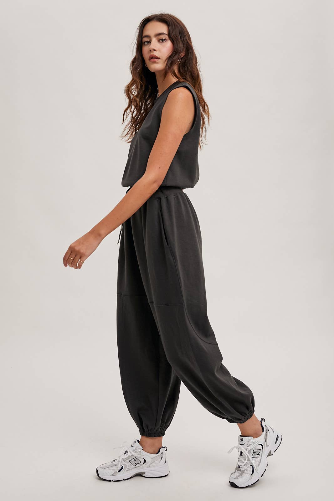 DRAWSTRING WAIST SLEEVELESS KNIT ACIVE JUMPSUIT: ECRU