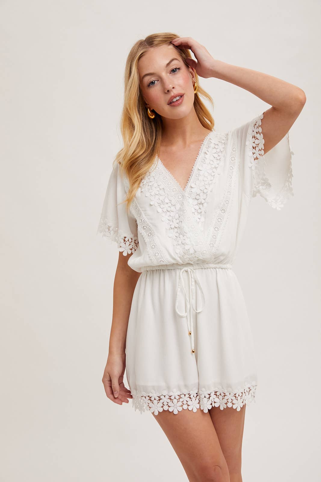 WRAP FLORAL LACE TRIMMED DRAWSTRING ROMPER: ALMOND